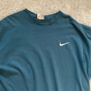 Vintage 90s Nike essential shirt… made in USA great condition, a little fading